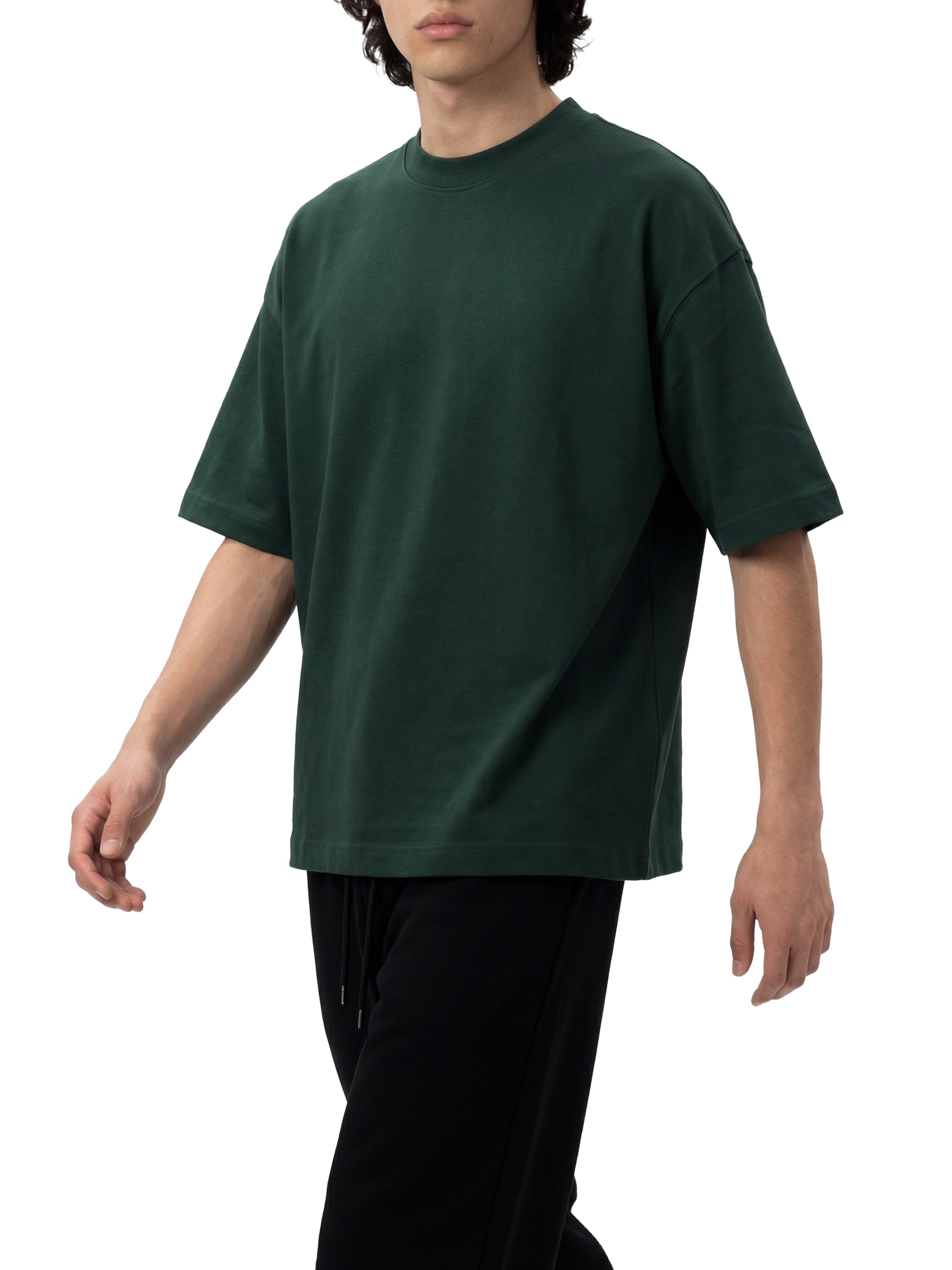 BLANKZ Ultraweight Box Tee — Dark Green, model front three-quarter view