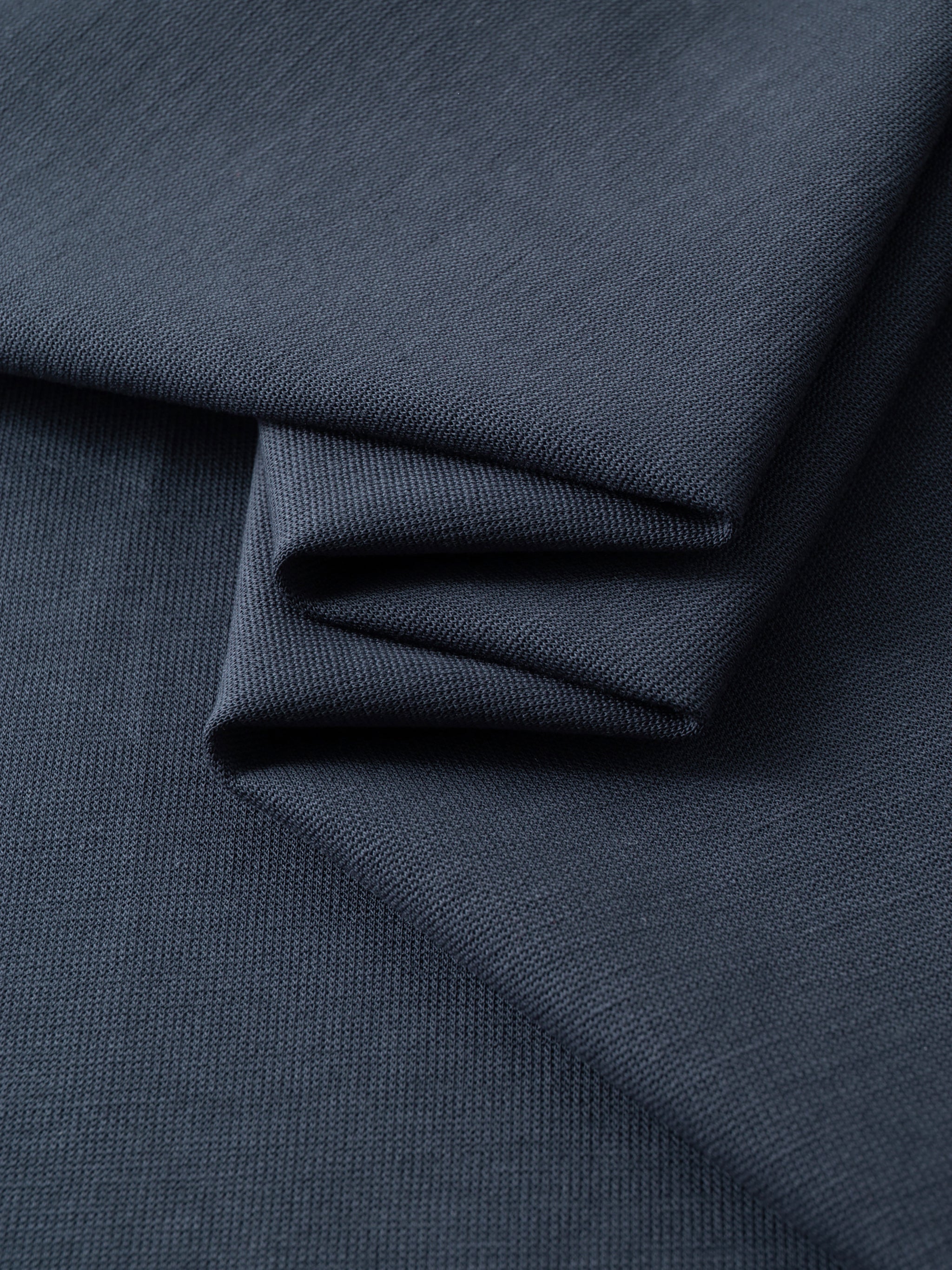 BLANKZ Relaxed Drop-Shoulder Polo — fabric drape close-up