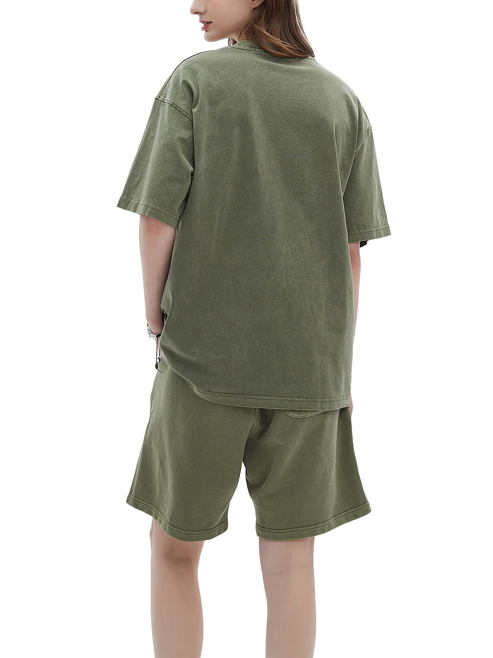BLANKZ Enzyme-Washed Tee — Model wearing the tee, rear three-quarter view