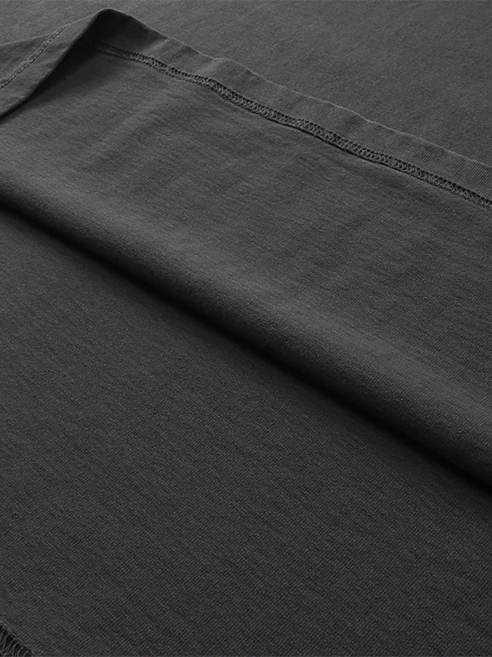 BLANKZ Enzyme-Washed Tee — Sleeve hem stitching detail