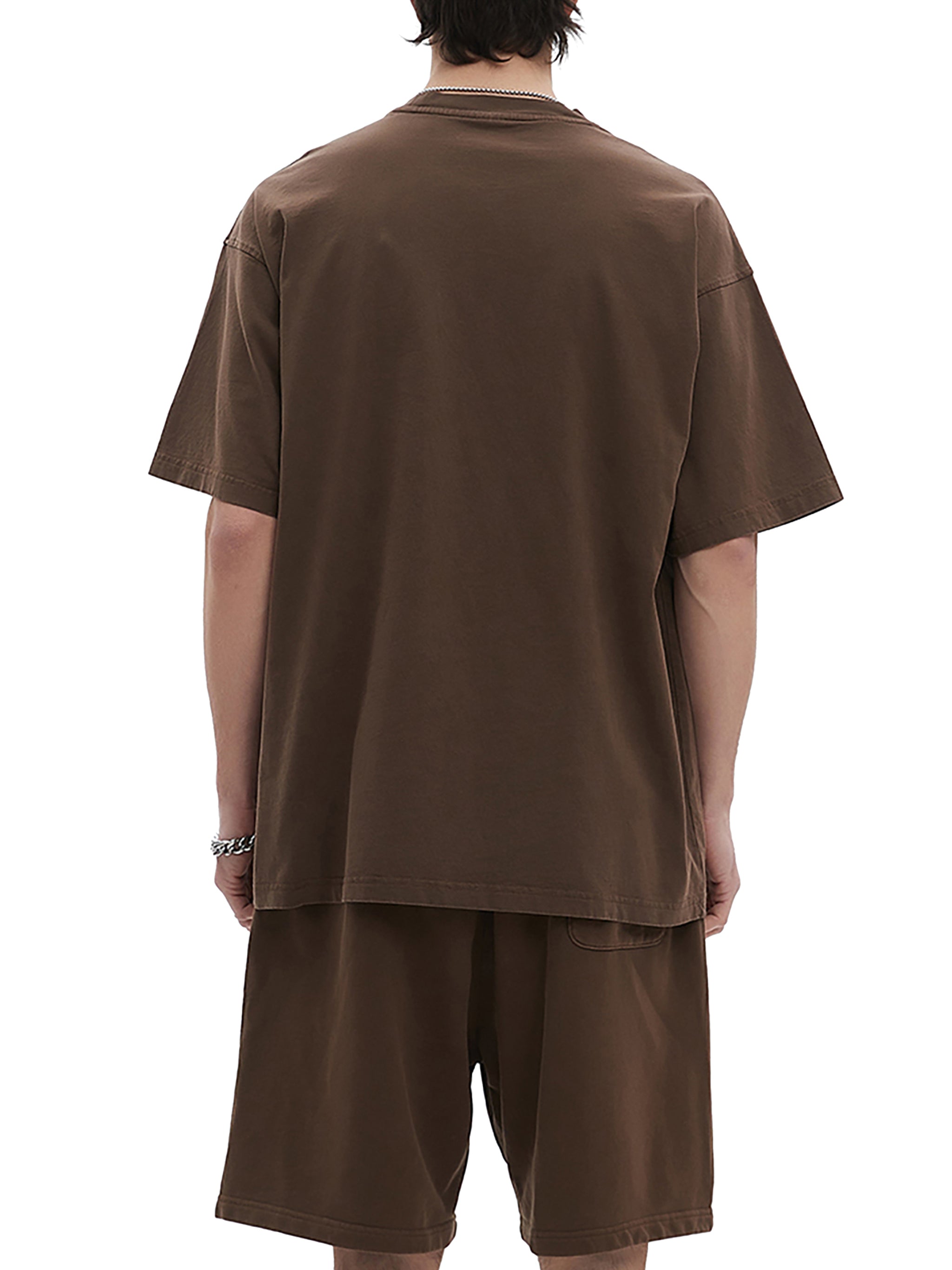 BLANKZ Enzyme-Washed Tee — Model wearing the tee, back view
