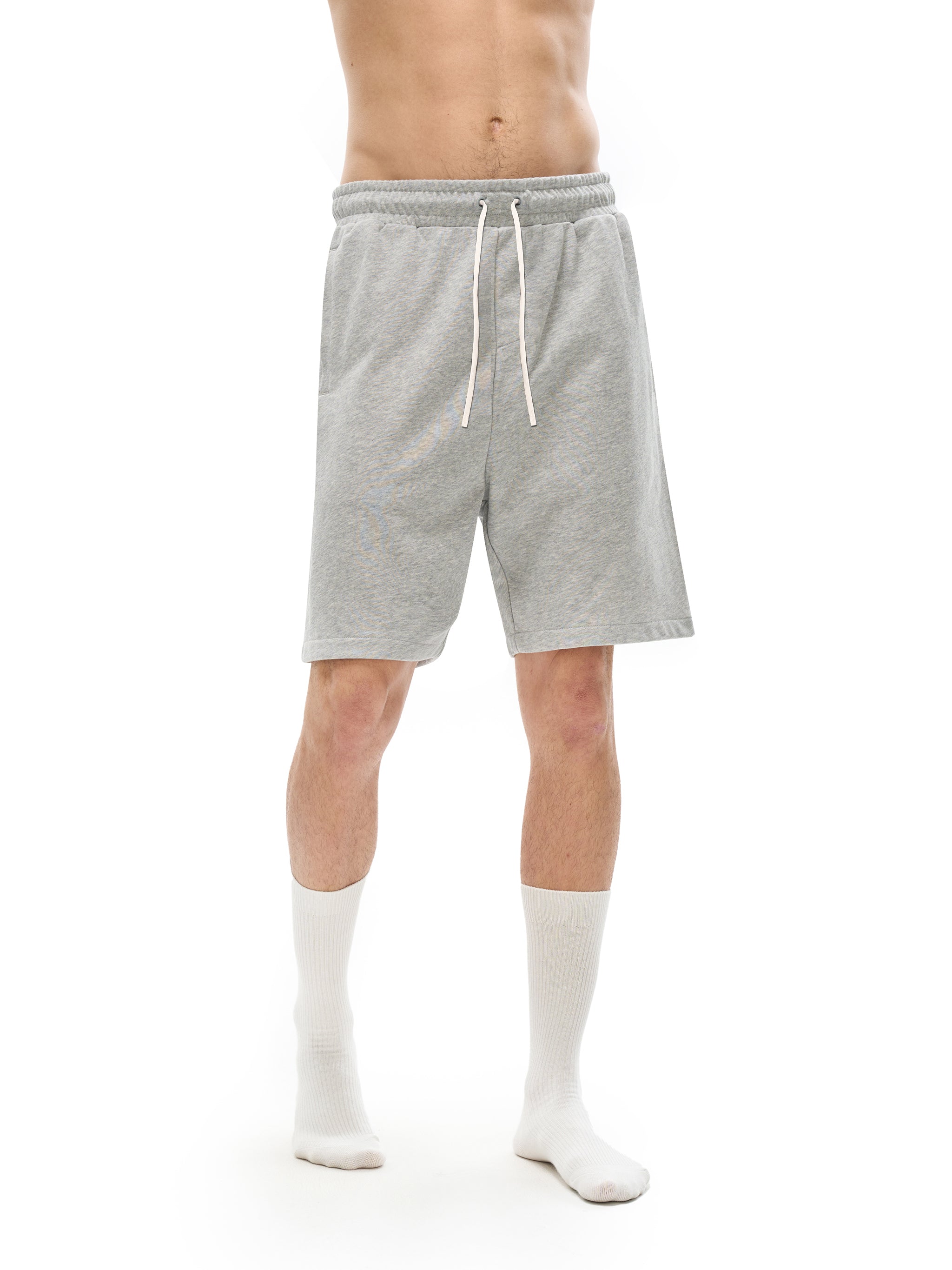 BLANKZ Essential Cotton Short — Model wearing the garment, side view