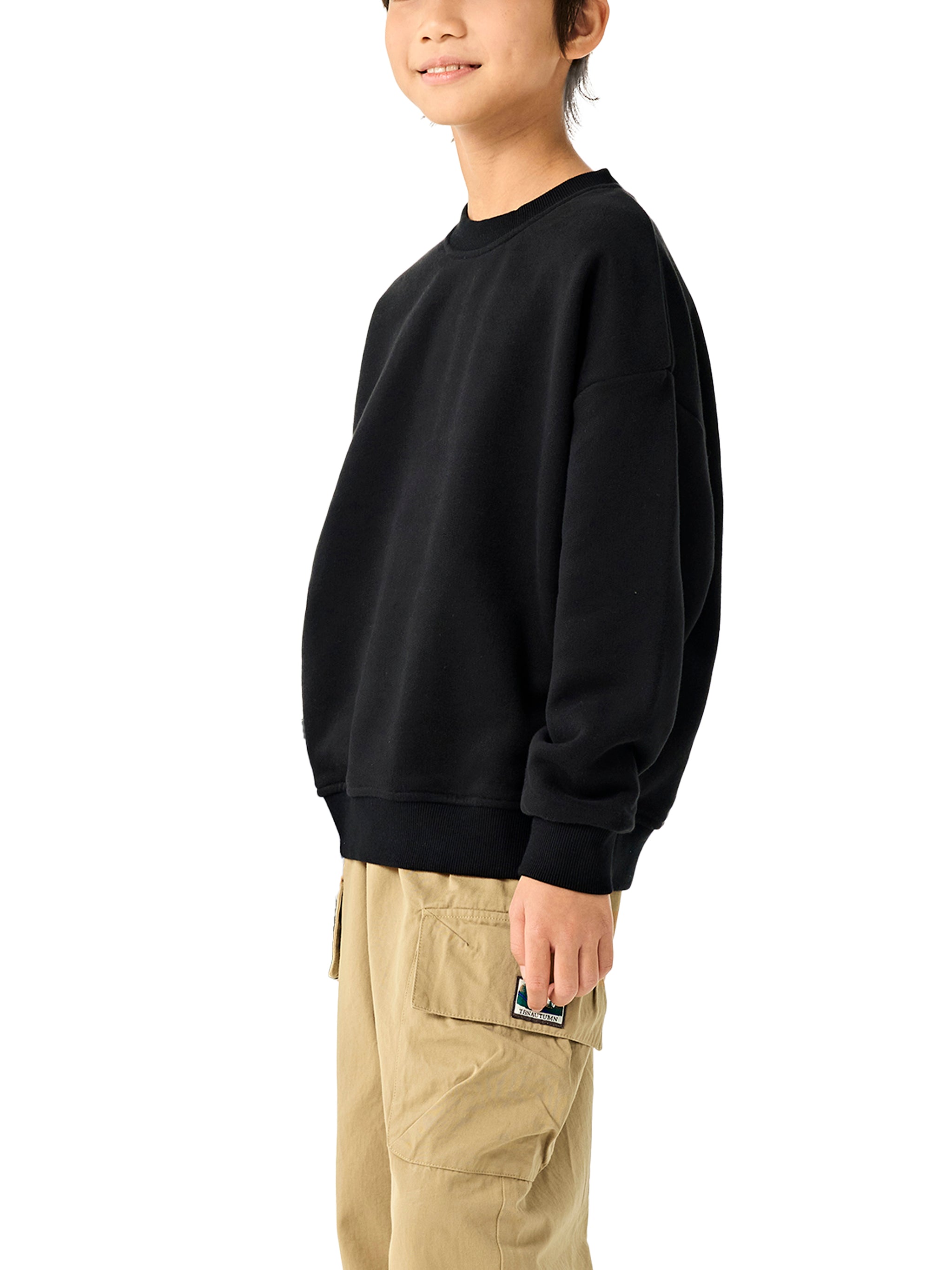 BLANKZ Kids' Essential Fleece Crewneck Sweatshirt — Black, side on model