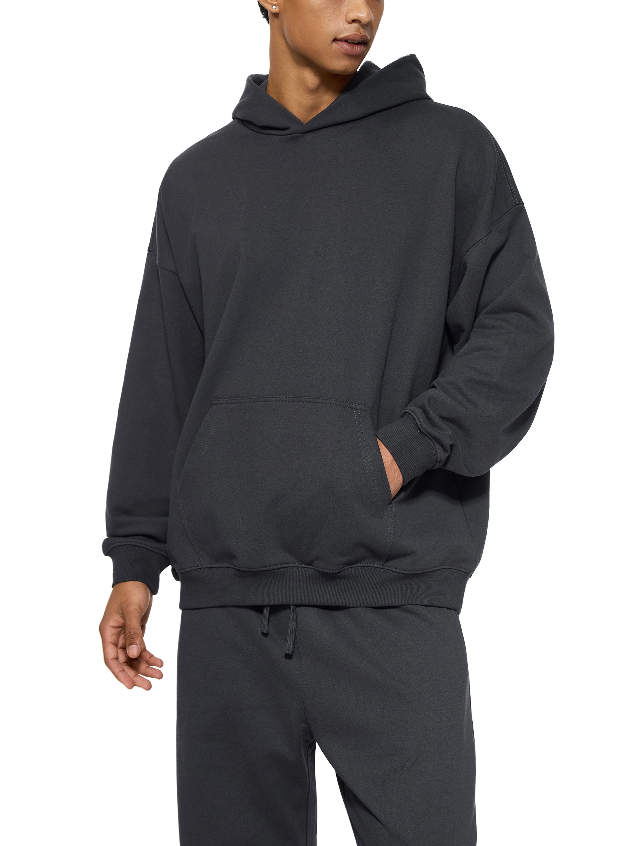 BLANKZ Essential Heavyweight Hoodie — Model wearing the garment, front three-quarter view