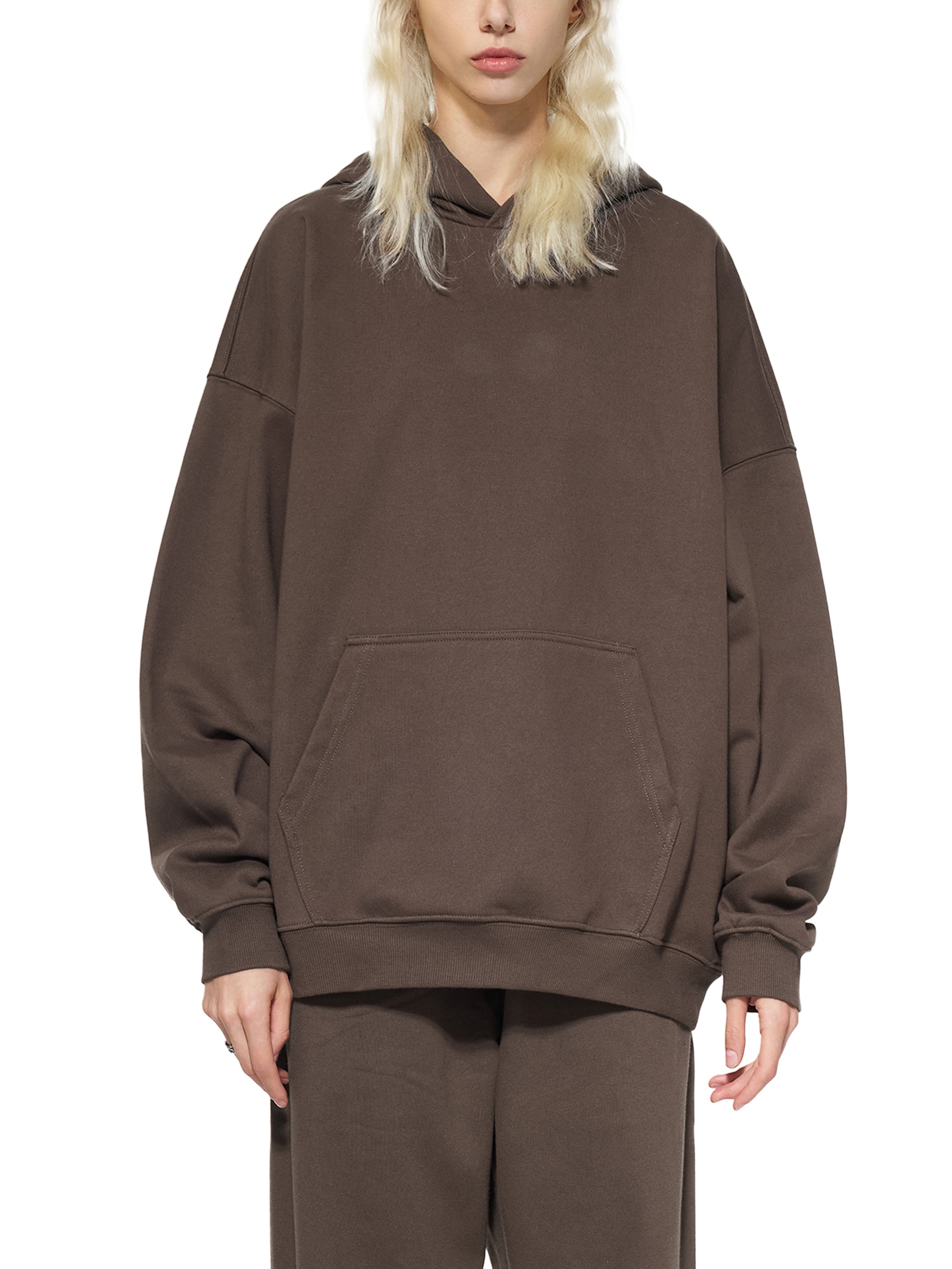 BLANKZ Essential Heavyweight Hoodie — Model wearing the garment, front three-quarter view