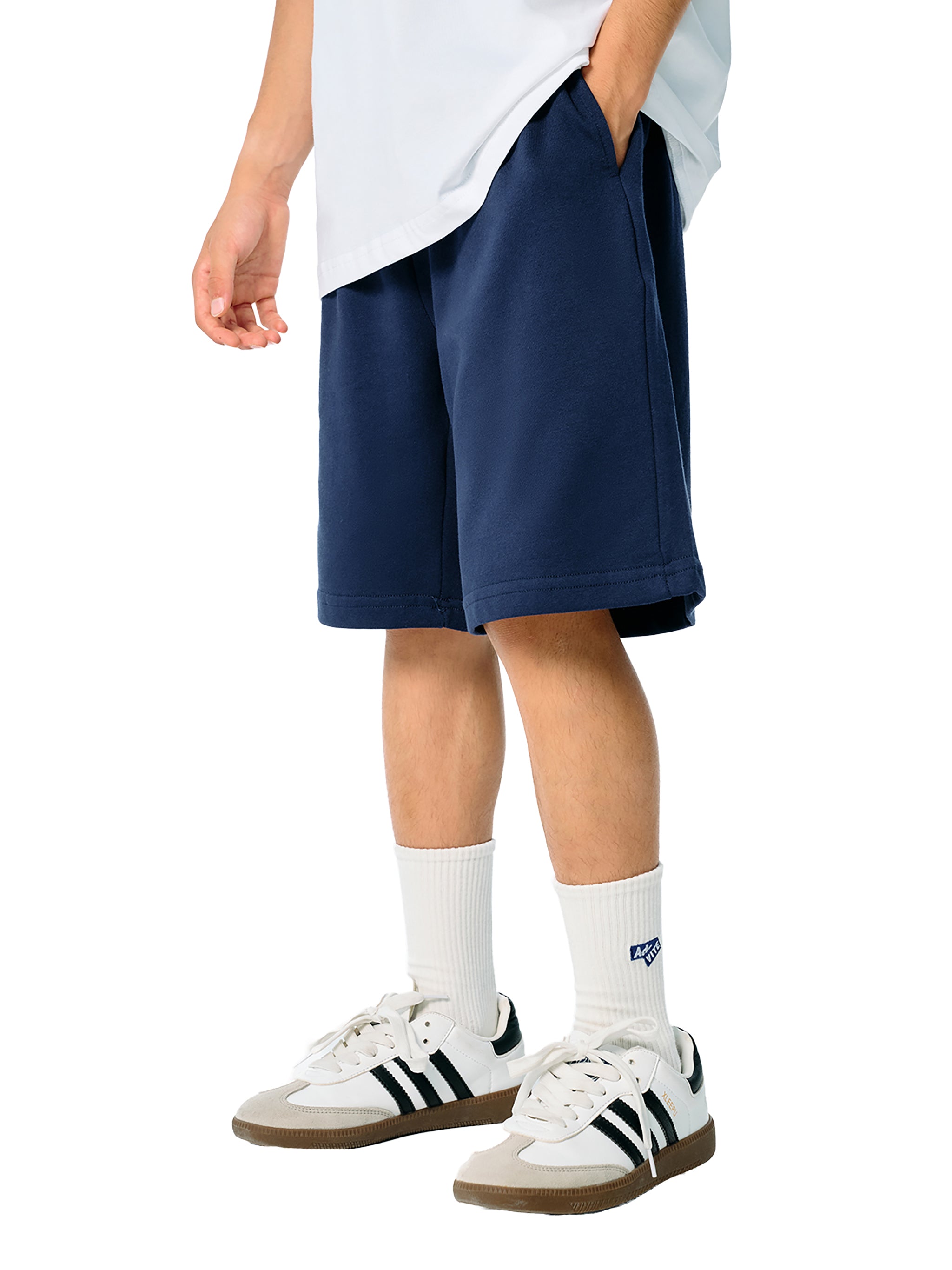BLANKZ Kids' Essential Shorts — Navy Blue, side on model