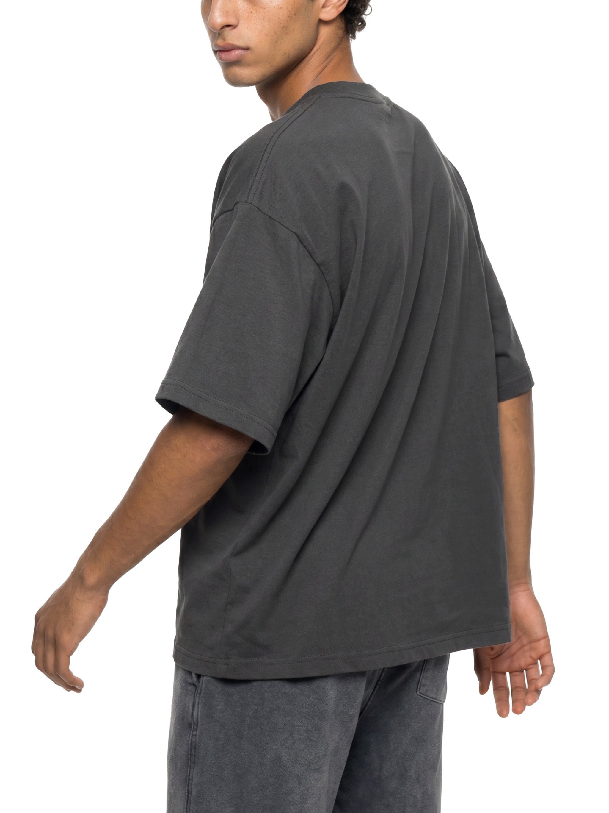 BLANKZ Sorona Box Tee 240 — Charcoal Gray, model rear three-quarter view