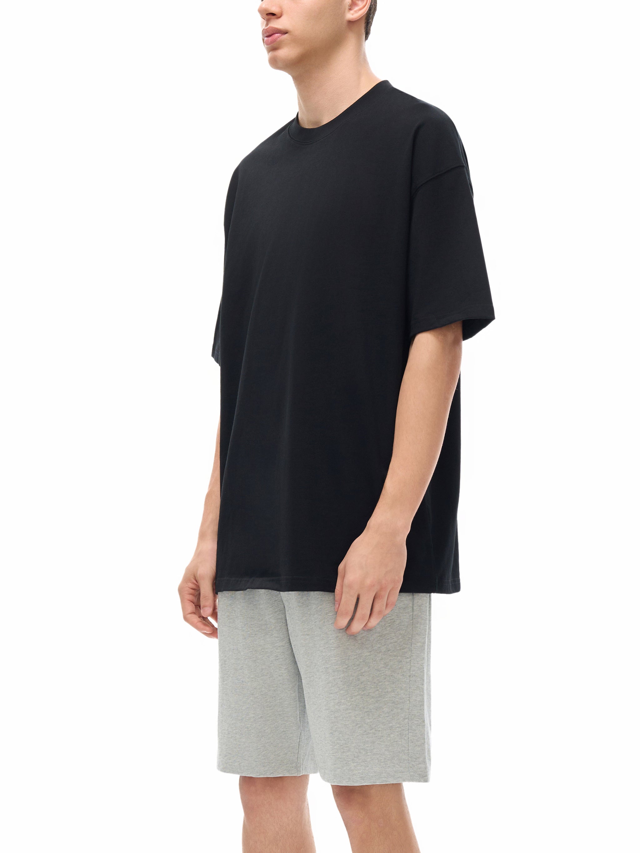 BLANKZ Loose Heavy Tee 275 — Model wearing the tee, side view
