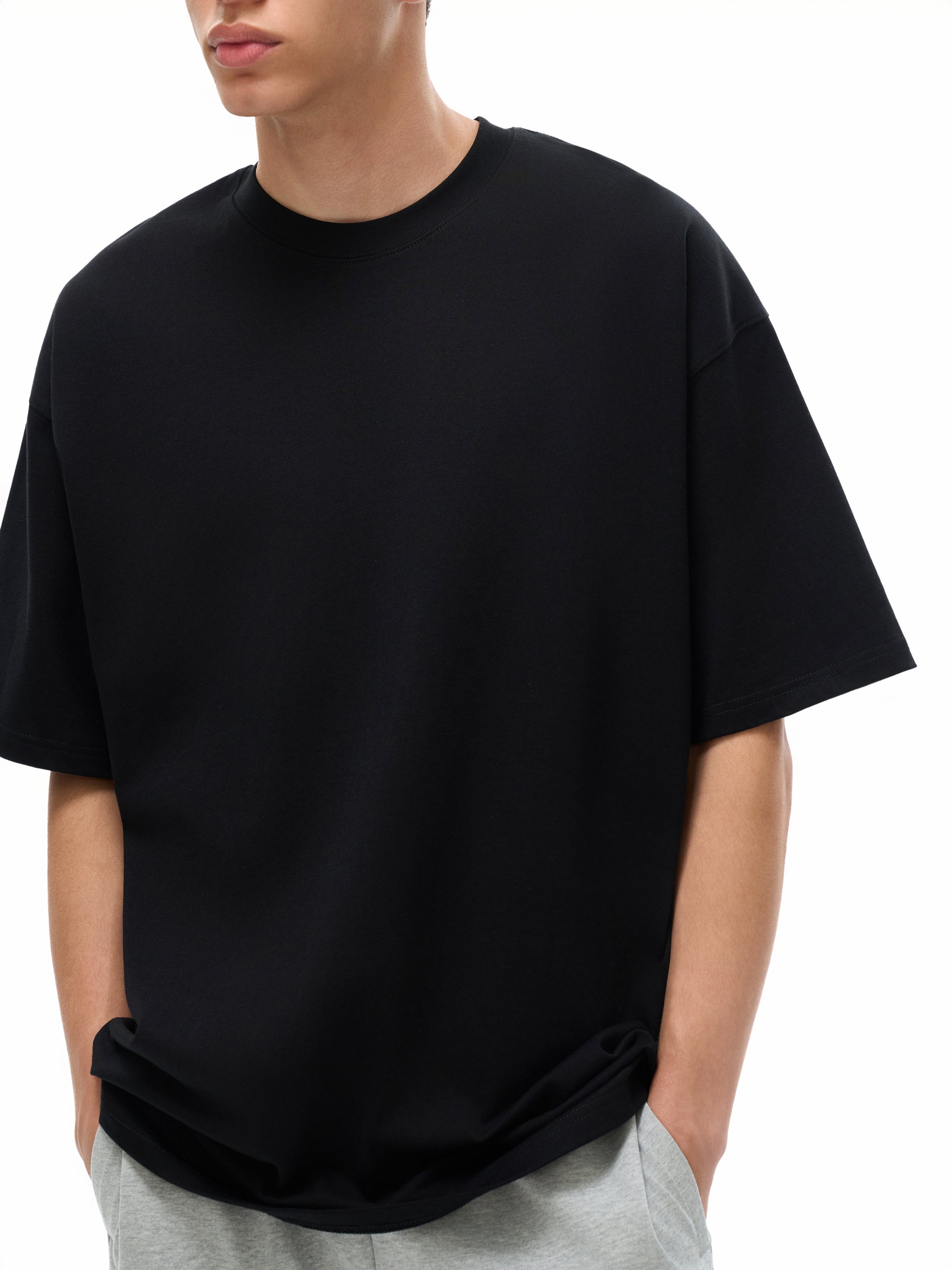 BLANKZ Loose Heavy Tee 275 — Model wearing the tee, front styling view