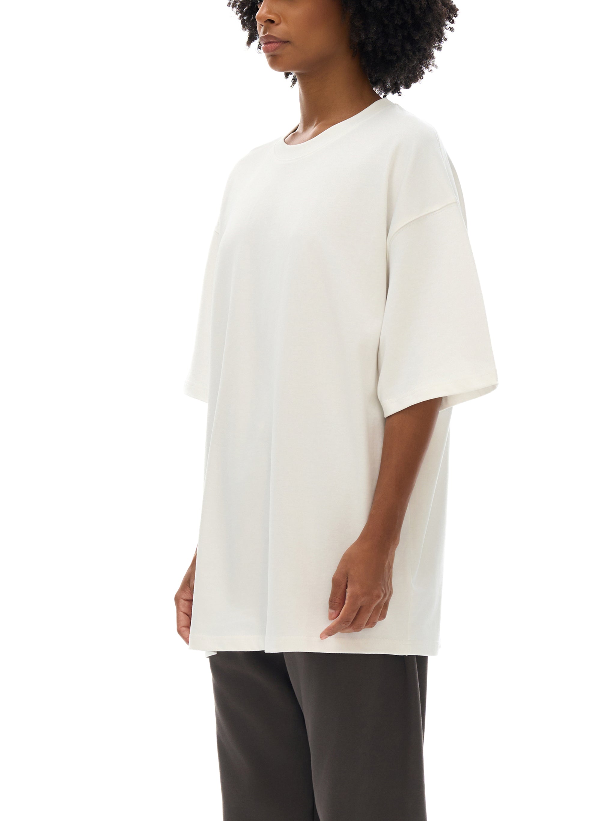 BLANKZ Loose Heavy Tee 275 — Model wearing the tee, side view