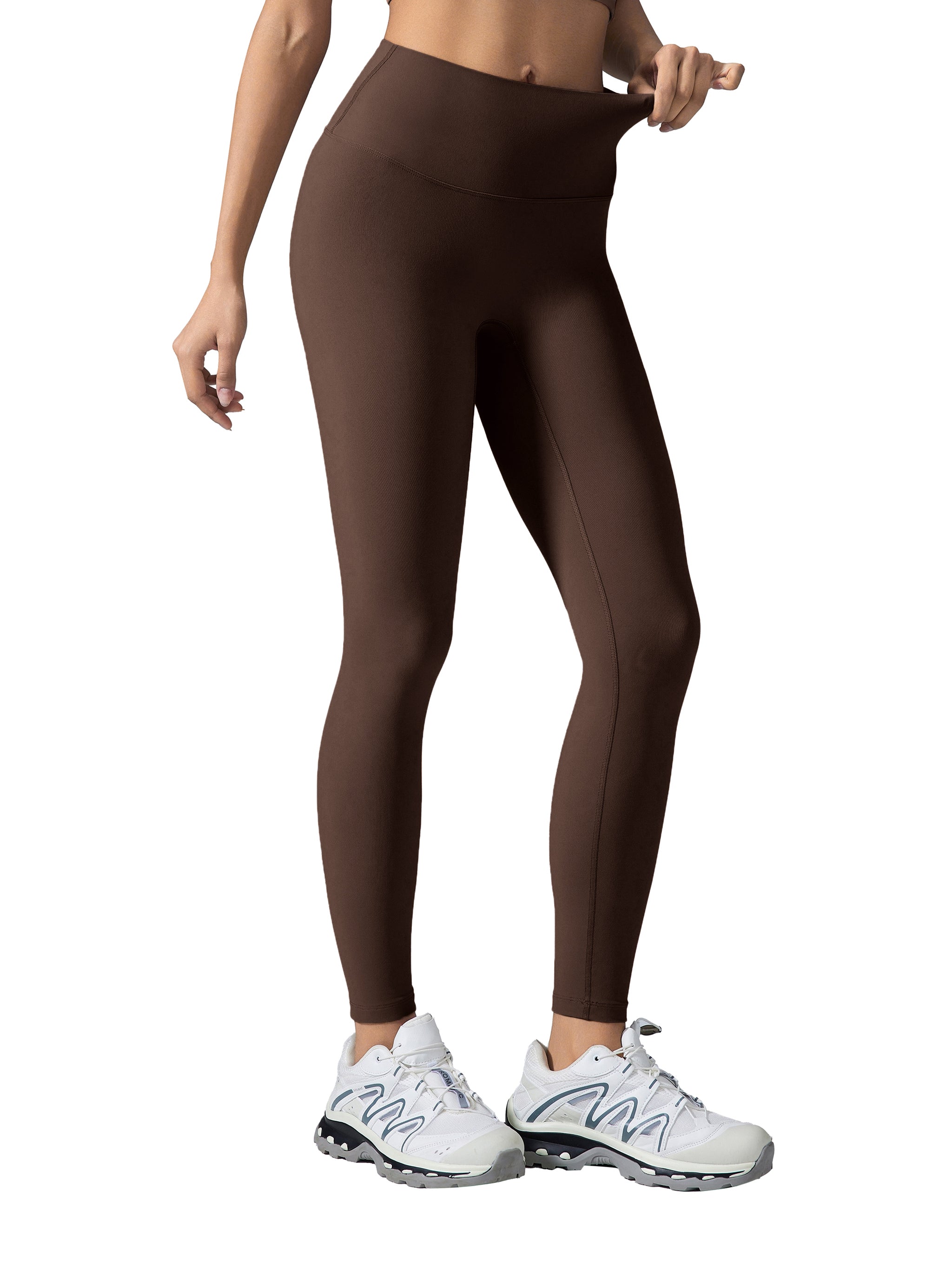 BLANKZ High-Waisted Yoga Leggings — Brown, waistband stretch on model