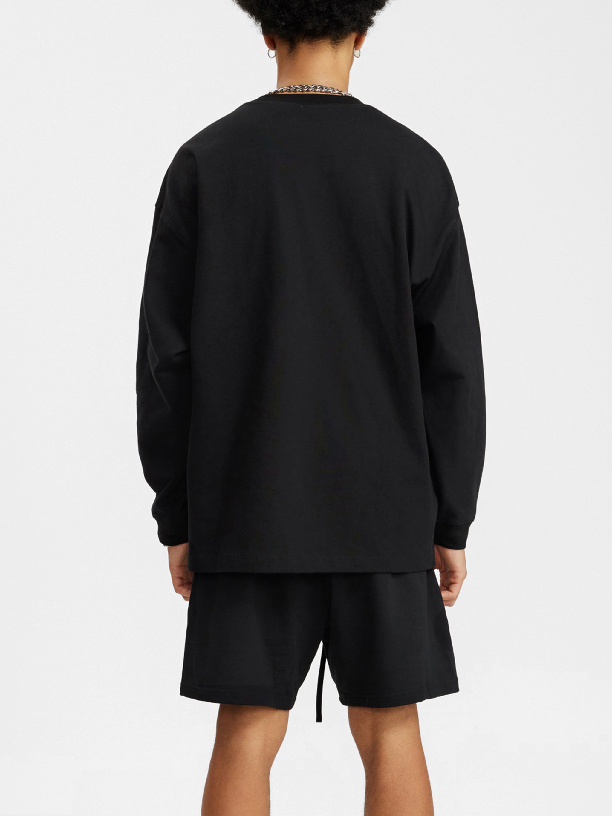 BLANKZ Oversized Long Sleeve 305 — Black — worn back view