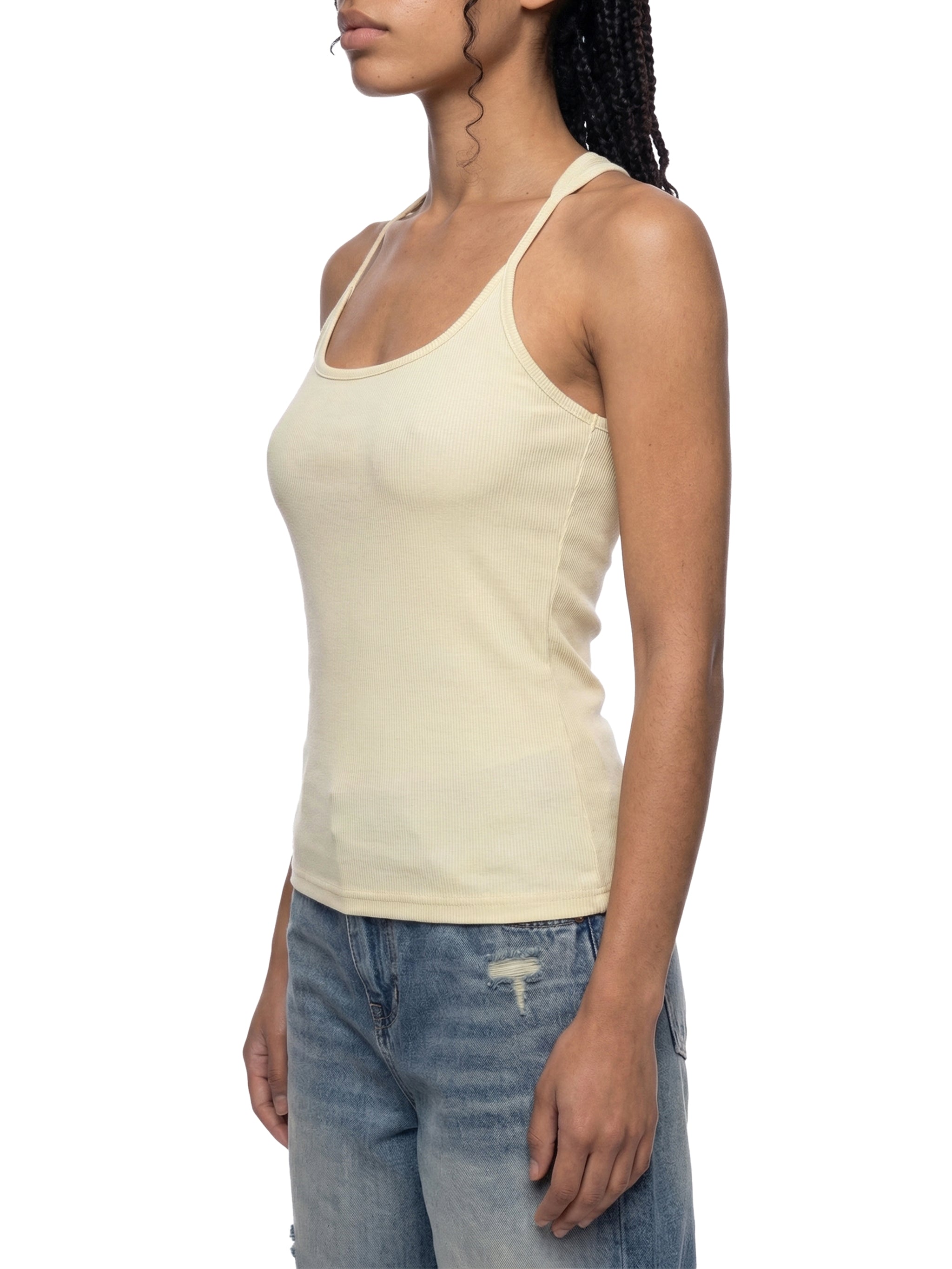 BLANKZ Slim Fit Ribbed Racerback Tank Top — Model wearing the garment, front three-quarter view