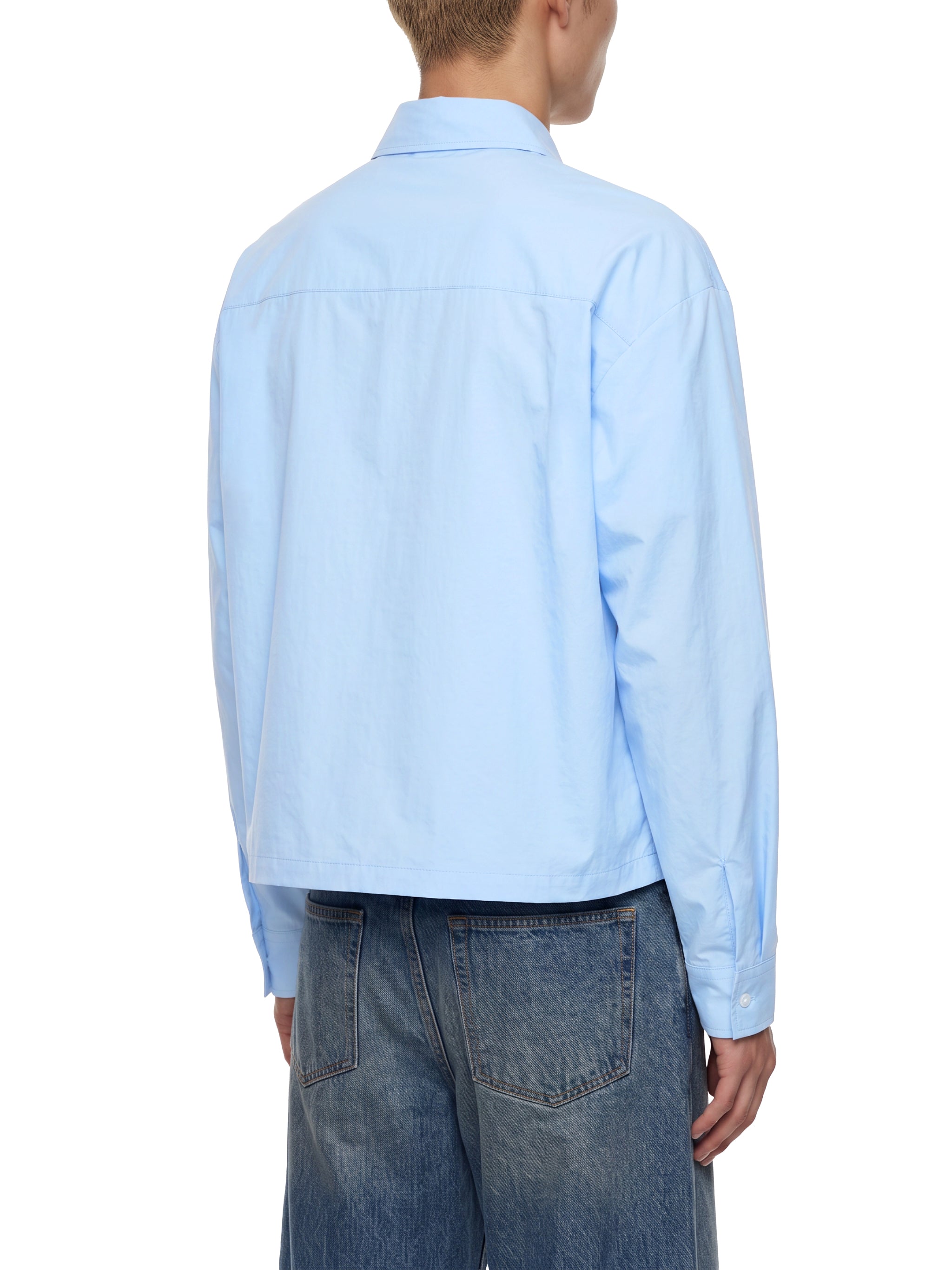 BLANKZ Light Long-Sleeve Shirt — Model wearing the garment, rear three-quarter view