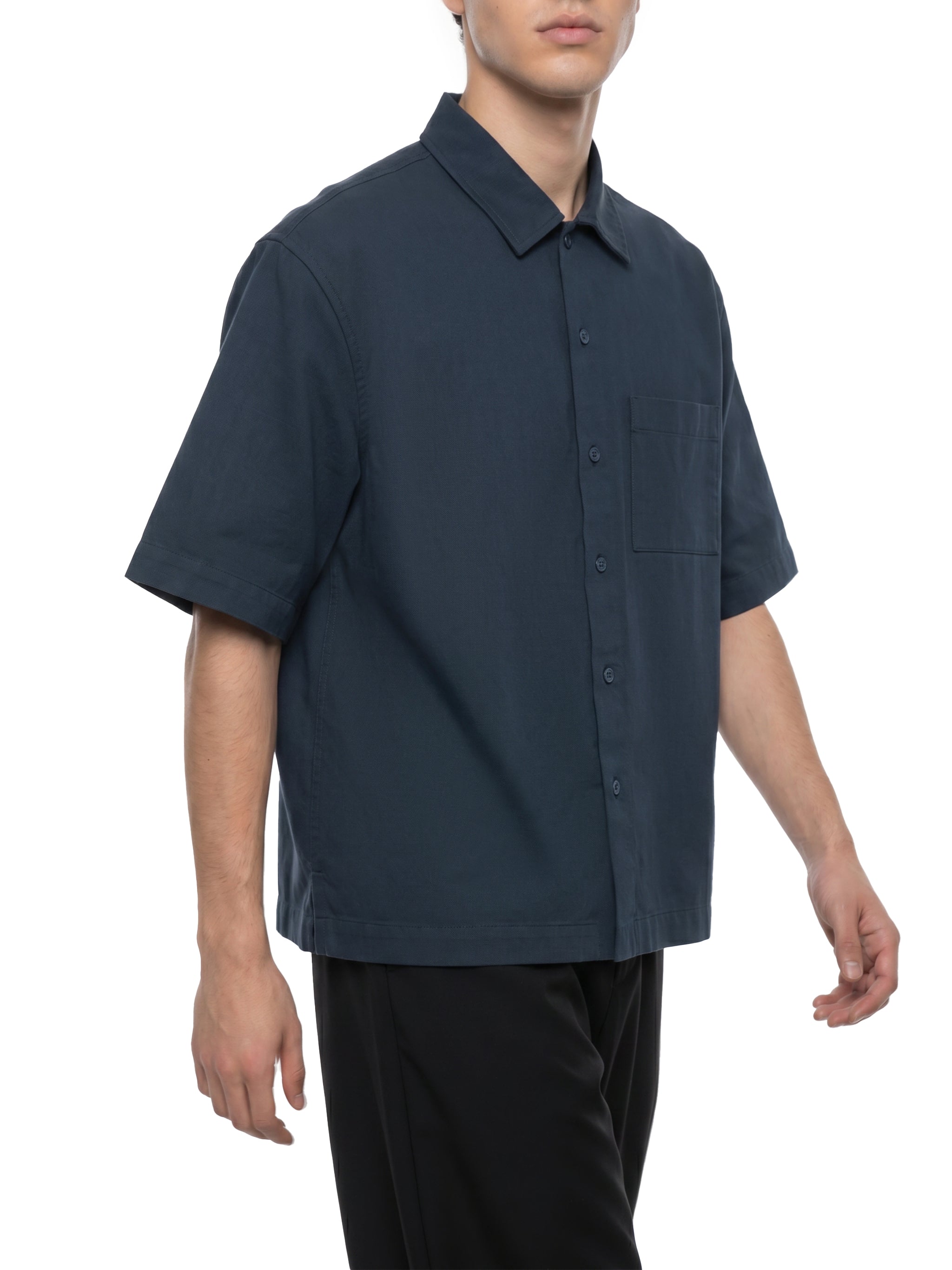 BLANKZ Patch-Pocket Shirt — Navy Blue — angled front view