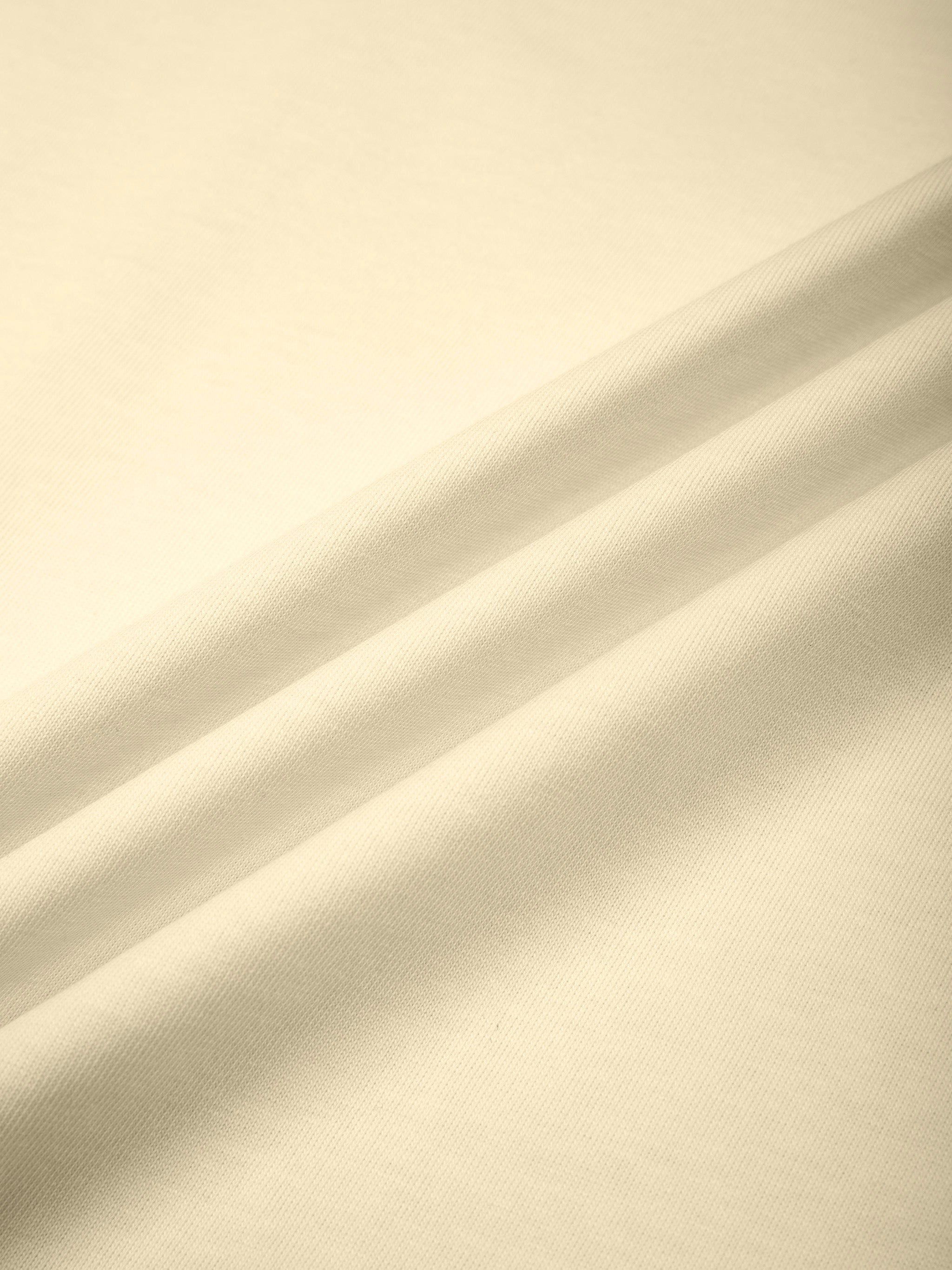 BLANKZ Color Block Polo Shirt — Apricot with Dark Green — cotton fabric folds
