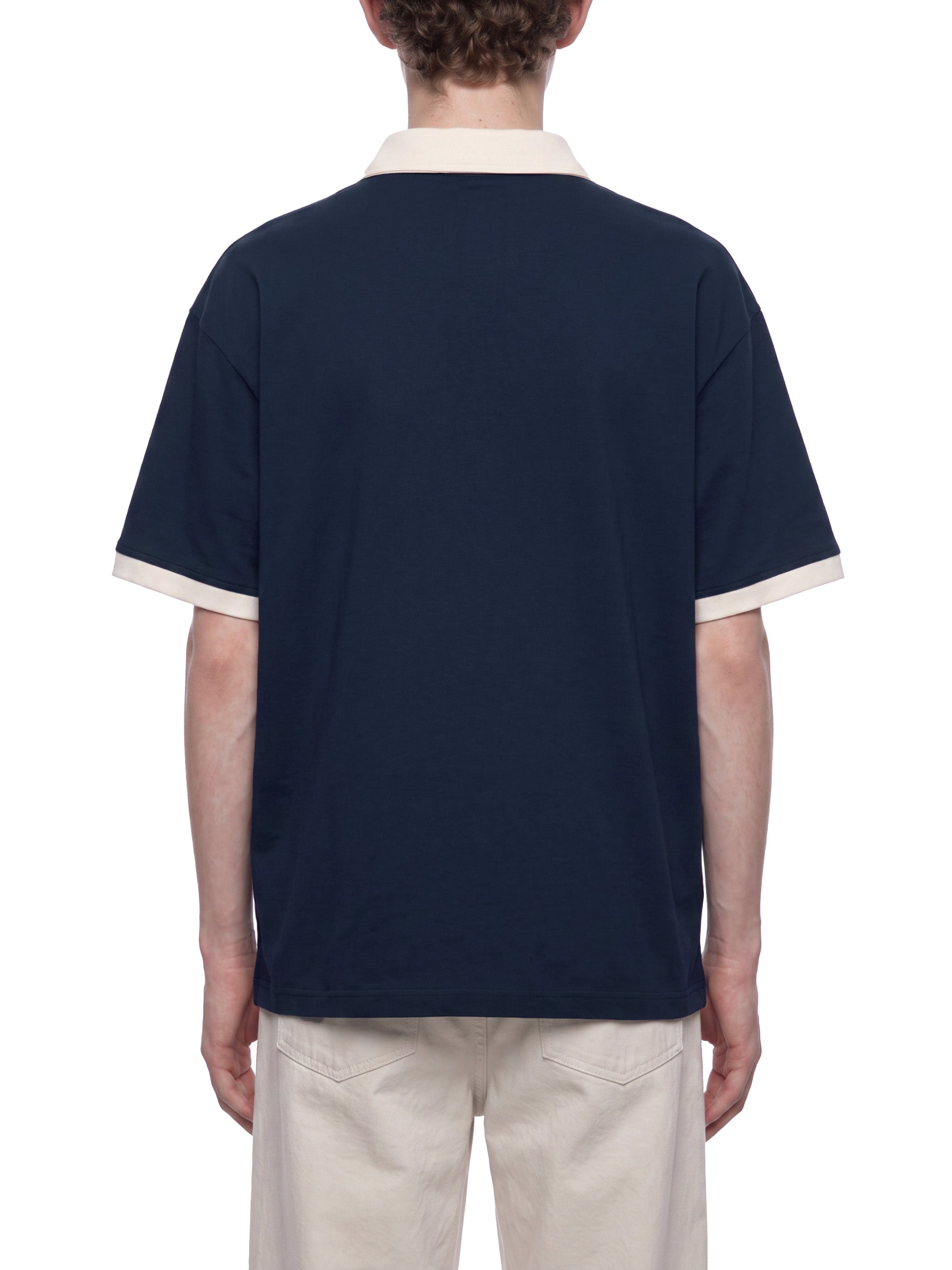 BLANKZ Color Block Polo Shirt — Navy Blue with Apricot — worn back view