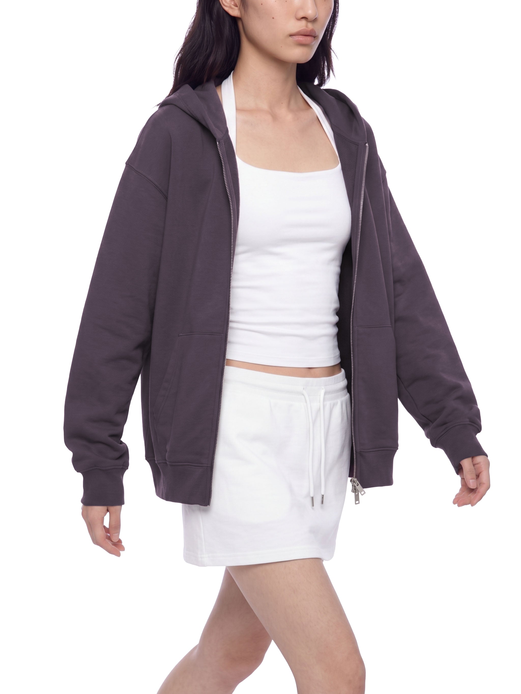 BLANKZ Heavyweight Zip Hoodie 420 — Model wearing the garment, front while walking view