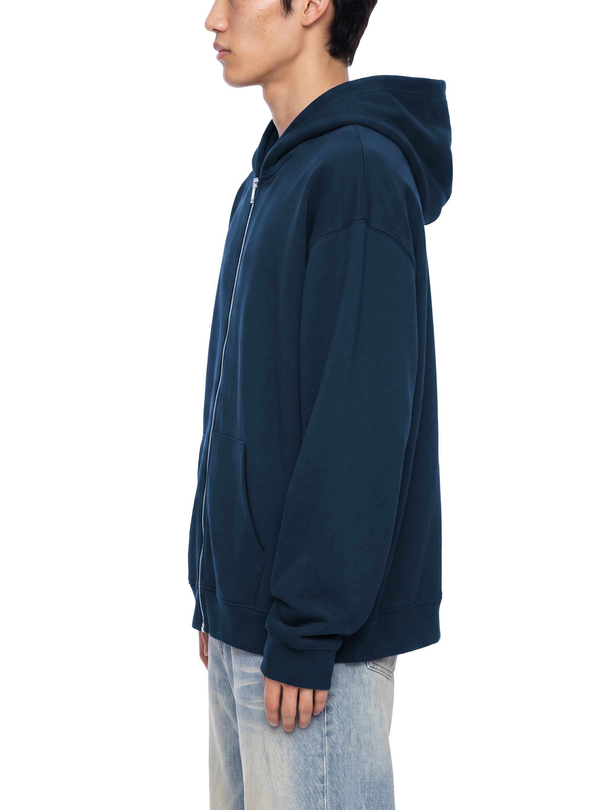BLANKZ Heavyweight Zip Hoodie 420 — Model wearing the garment, side view