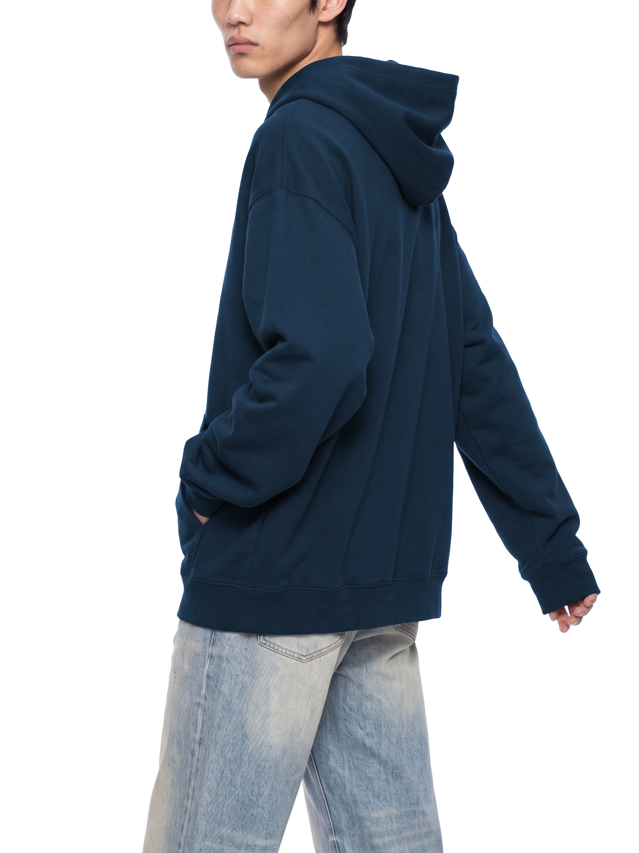BLANKZ Heavyweight Zip Hoodie 420 — Model wearing the garment, rear three-quarter view