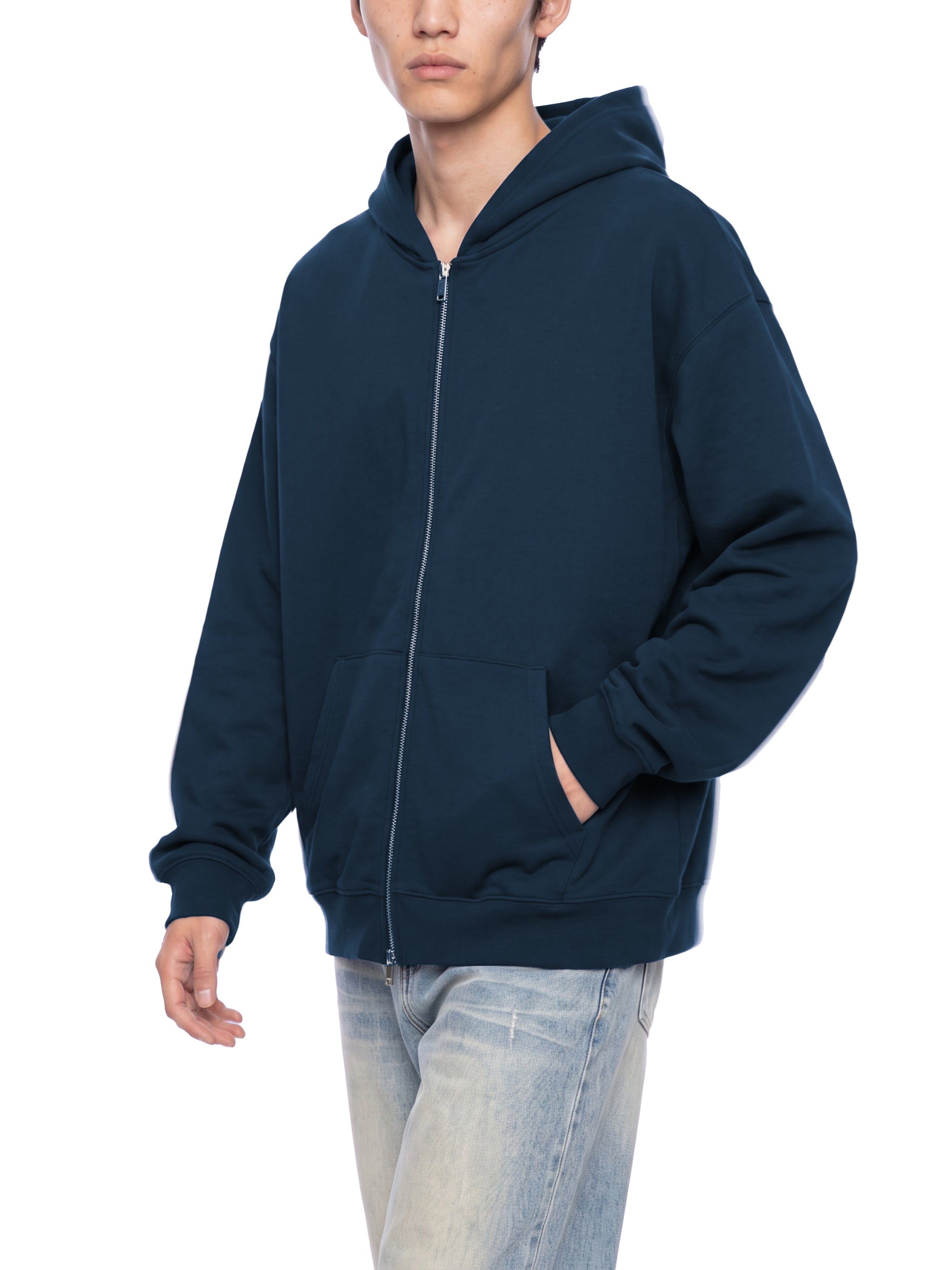 BLANKZ Heavyweight Zip Hoodie 420 — Model wearing the garment, front three-quarter view