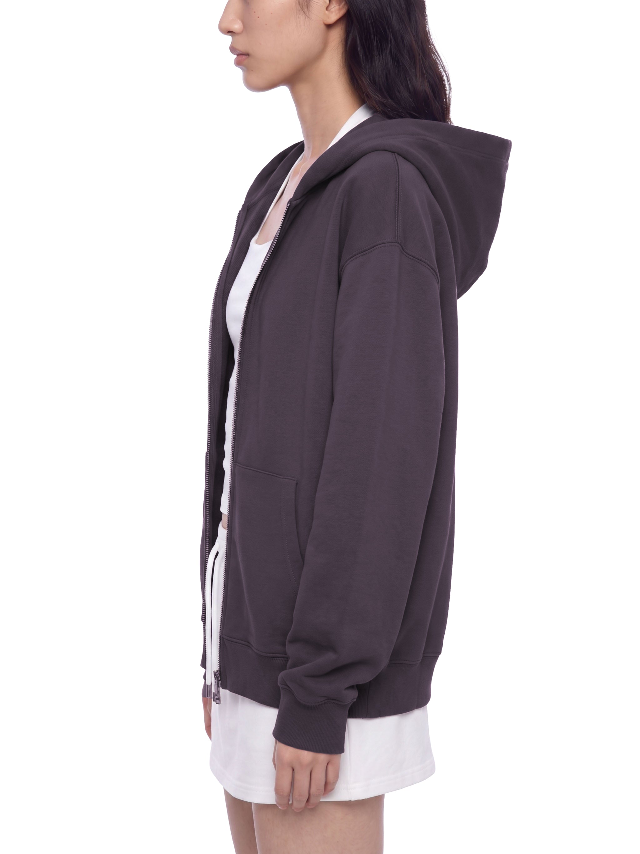BLANKZ Heavyweight Zip Hoodie 420 — Model wearing the garment, side view