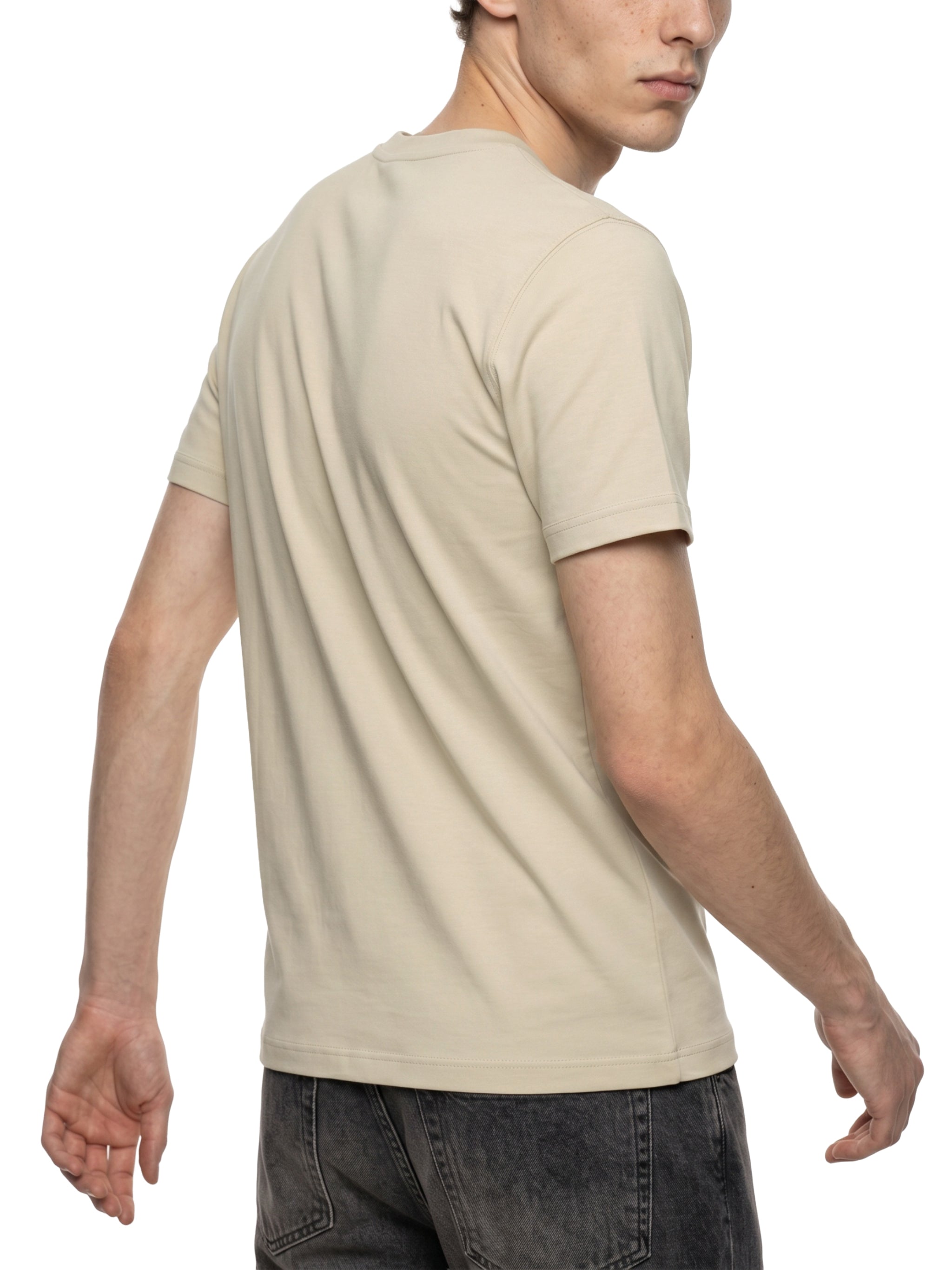 BLANKZ Heavy Slim Tee — Model wearing the tee, rear three-quarter view