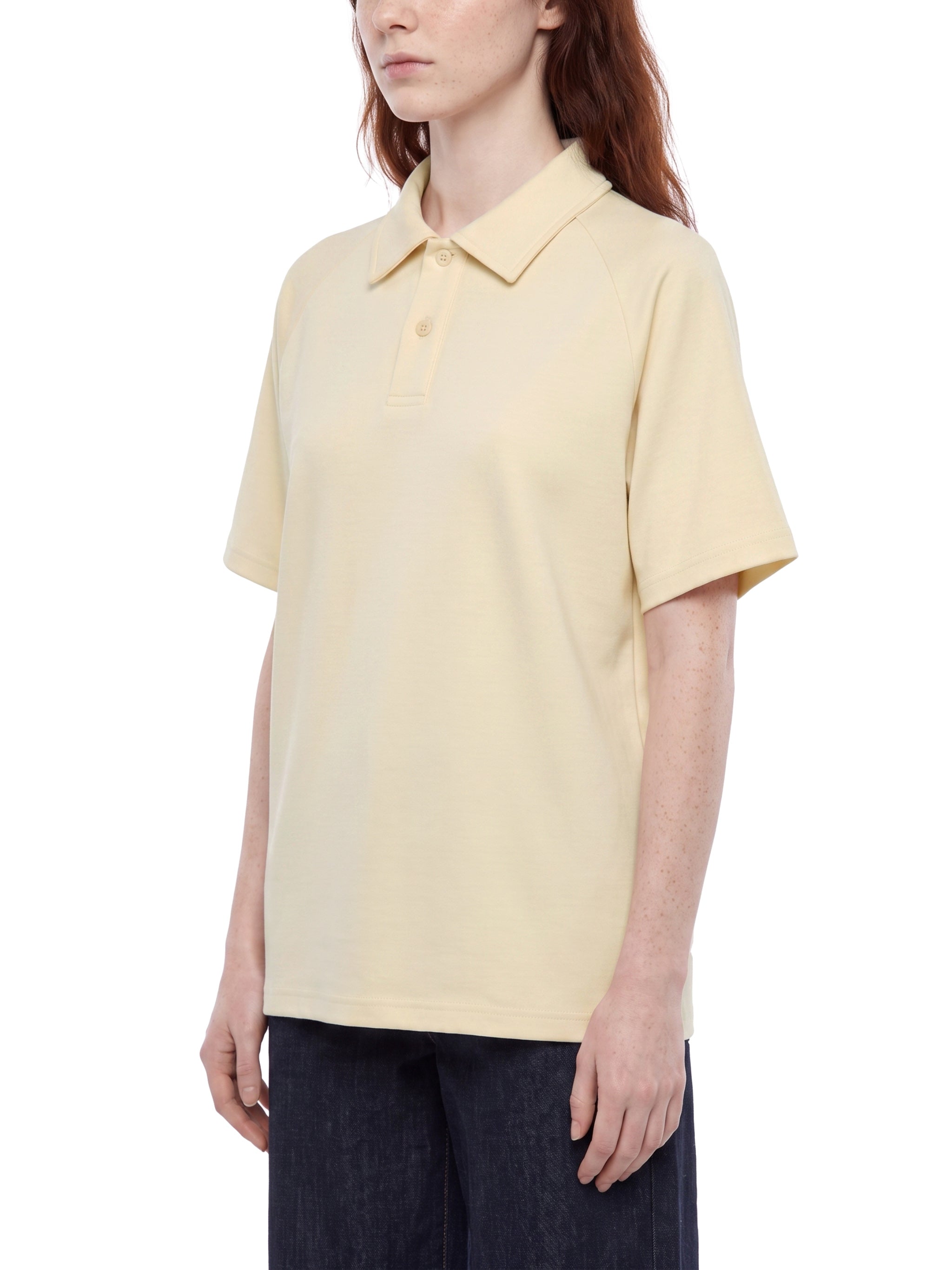 BLANKZ Everyday Raglan Polo — Model wearing the garment, front three-quarter view