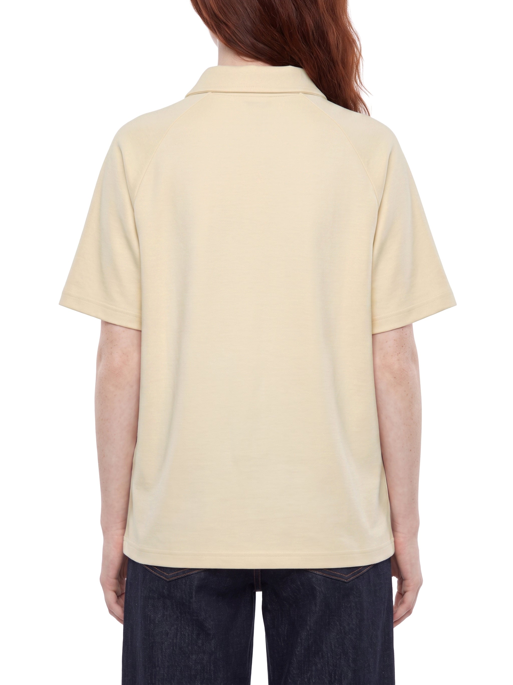 BLANKZ Everyday Raglan Polo — Model wearing the garment, back view