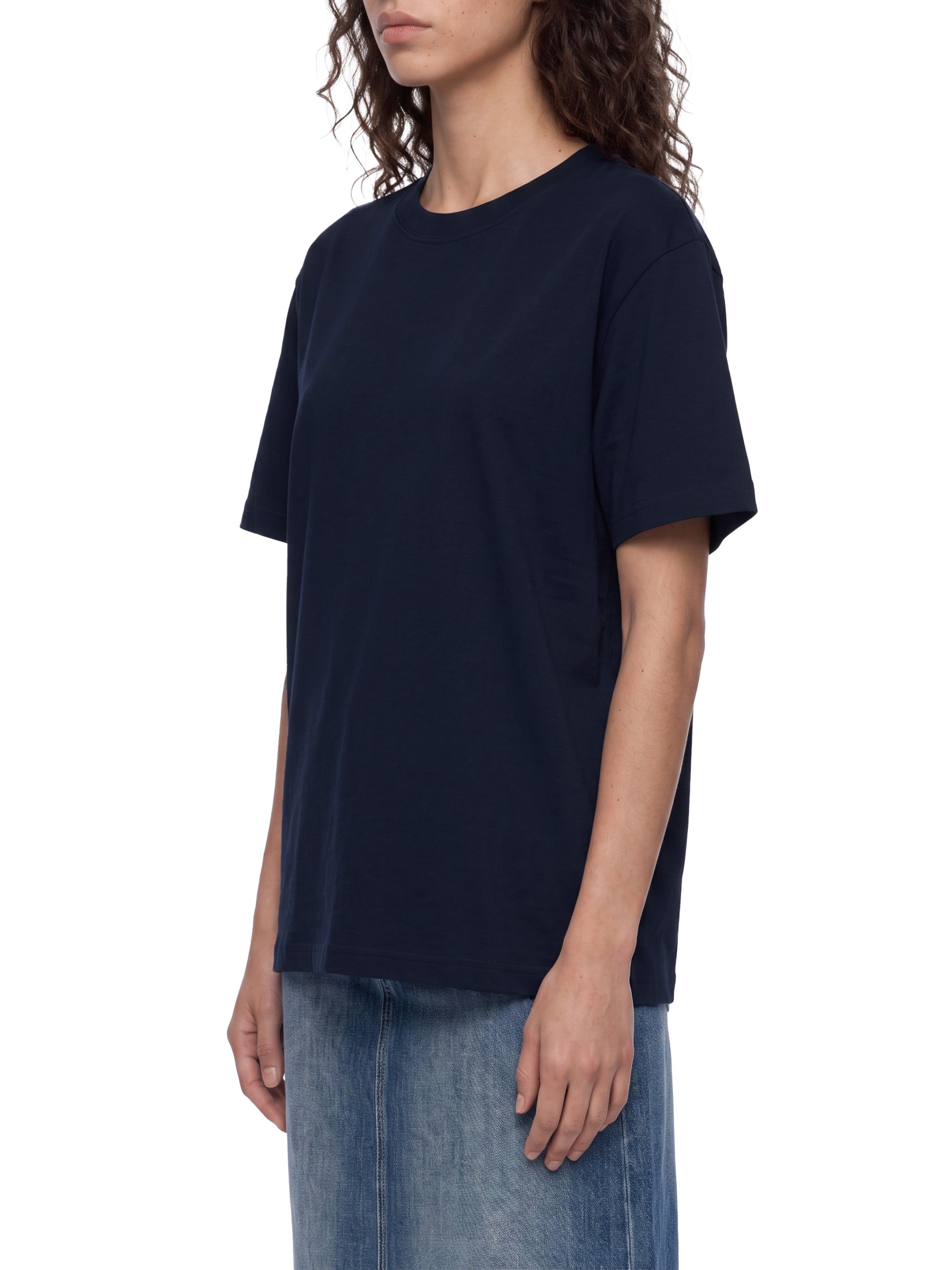 BLANKZ Everyday Cotton Tee — Model wearing the tee, front three-quarter view